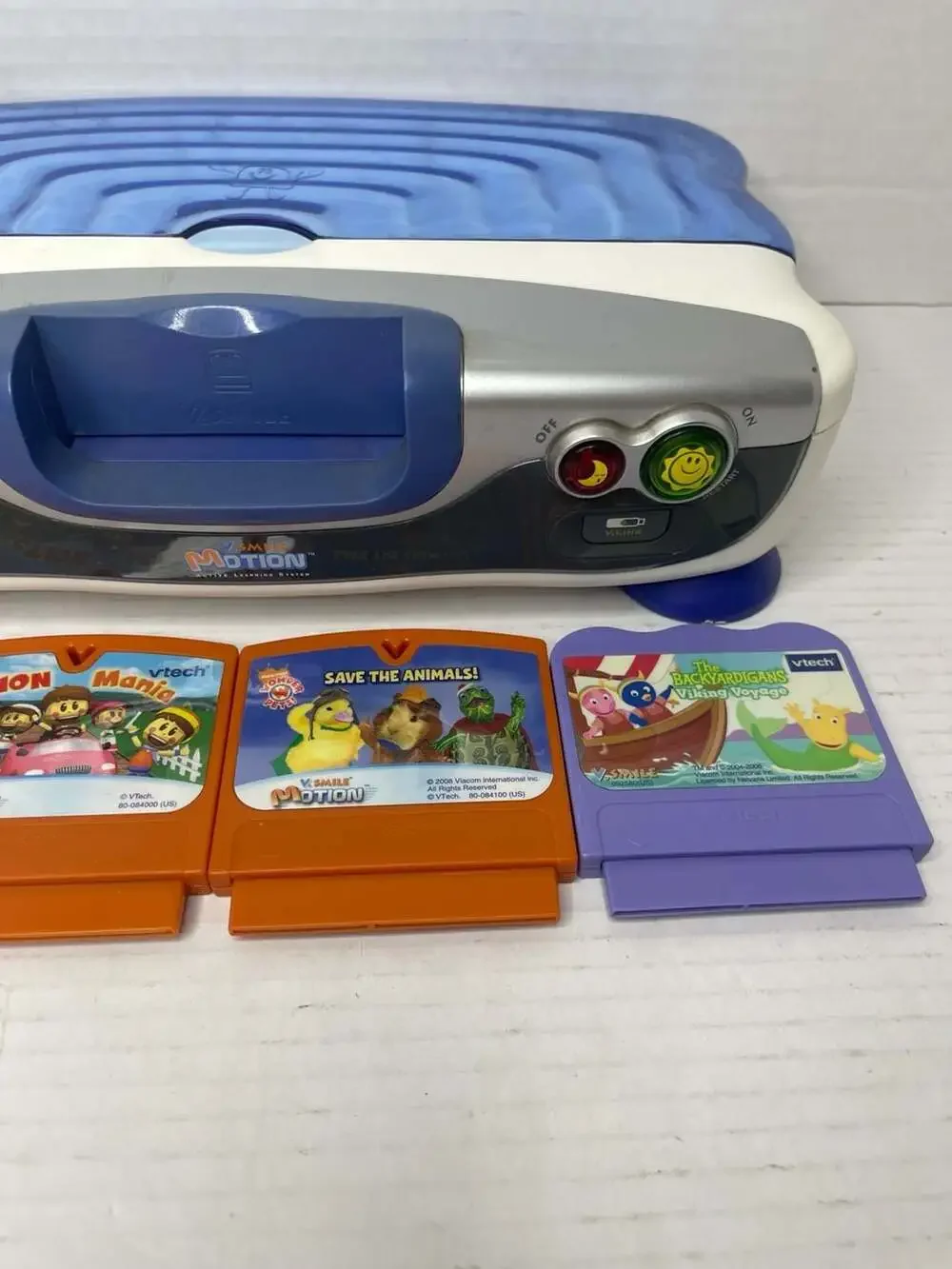 VTech V.Smile Motion Active Learning System Console with 4 Games Read